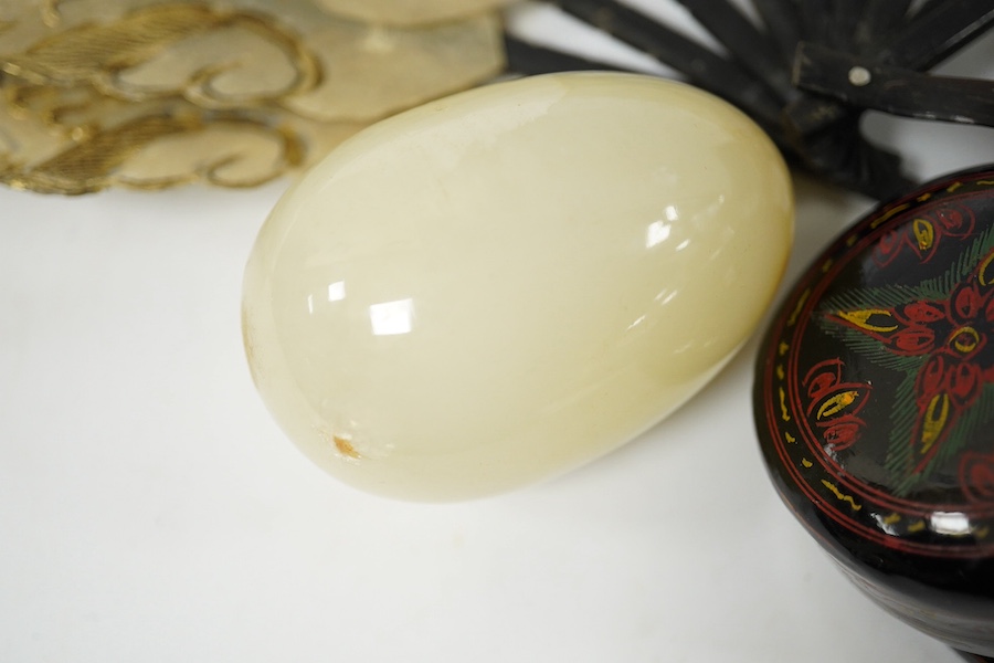 A Chinese famille rose plate a vellum fan, a small group of miniature books, lacquer box and onyx egg, fan 35cm wide. Condition - plate slight chip, rest fair to good